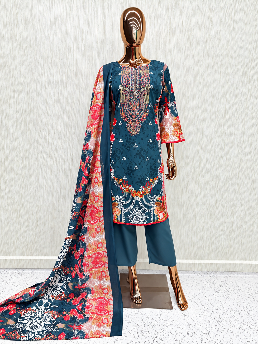 Model wearing premium Pakistani suit from Royal Fashion